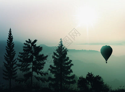 热气球飞过群山图图片