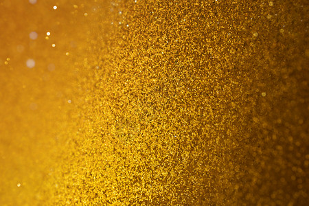 金色闪光粒子背景图片-金色闪光粒子背景素材-金色闪光粒子底图-摄图