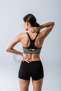 女运动员背面的颈部疼痛在图片