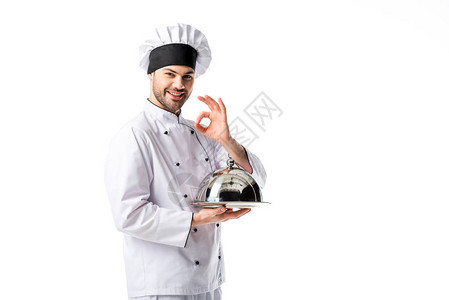 手持托盘的厨师笑着在白色上单处图片