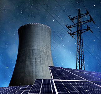太阳能电池板核电站和夜间电力塔图片