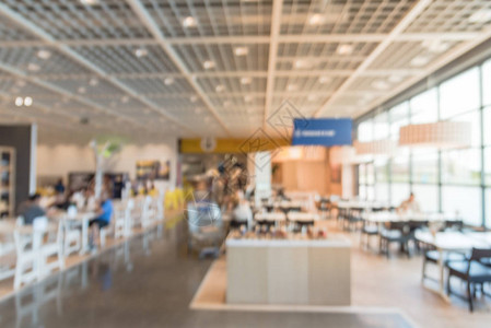 美国德克萨斯州购物中心或公司的大型自助餐厅食堂美食广场图像模糊图片