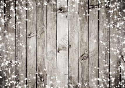 白雪和星的棕色木质料图片