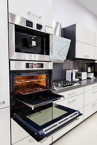 现代奢侈品定制高尖黑白厨房清洁室内设计以开着图片