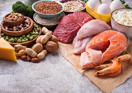 蛋白质含量高的健康食品肉鱼乳制品坚果和豆类背景图片