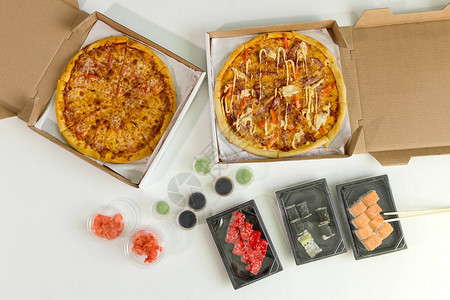 寿司和披萨商业午餐概念白色背景图片