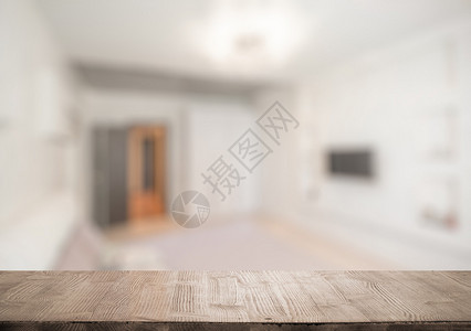 客厅背景模糊中的老式木桌背景图片