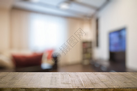 客厅背景模糊中的老式木桌背景图片