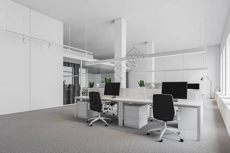 以白色墙壁地毯板和黑椅白电脑桌排成的白色桌子为圆角的工业风格背景图片