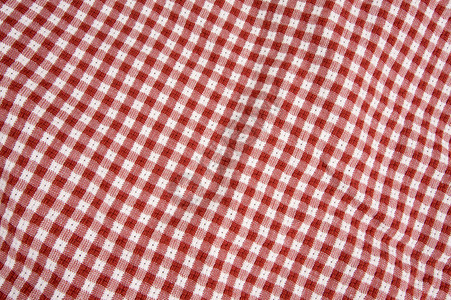 红白格子红色和白色方格野餐毯细节背景