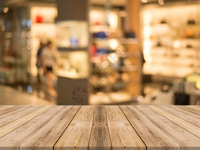 在商场模糊商店的透视棕色木材可用于展示或蒙太奇您的产品图片