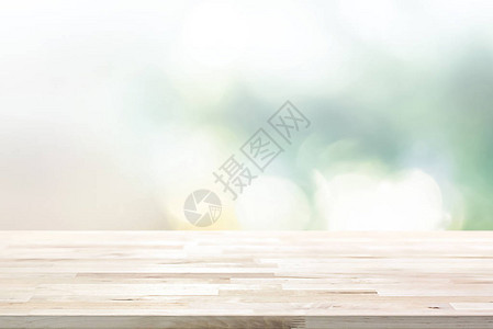 模糊的抽象白绿色布OKh背景上的木质表顶层可用于显示或补装产背景图片
