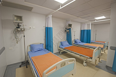 私人医院重症监护病房的病床背景图片