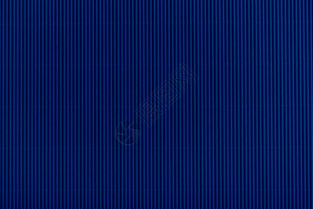 高清背景图片深蓝色纸板纹理的特写视图高清背景图片橙色瓦楞纸板纹理