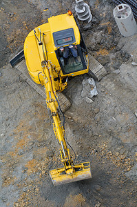 挖掘机挖掘机在施工现场挖掘和挖掘图片
