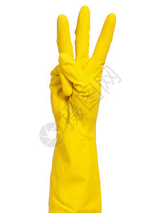 女手戴黄色手套在白色背景图片