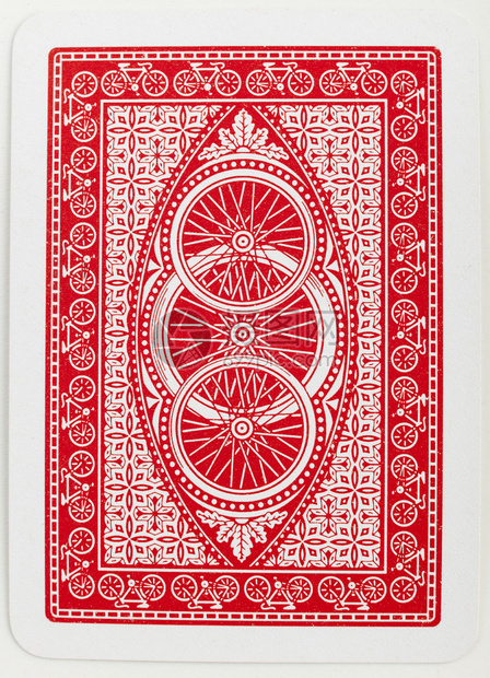 扑克牌背面红色抽象花卉图案特写图片