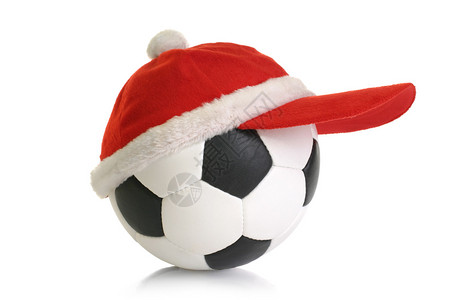 足球隔离的红色圣诞红帽图片