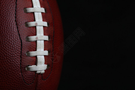 美国专业足球鞋带以体育背背景图片