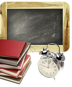 纯色背景上的书籍时钟和黑板背景图片