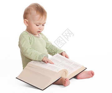 婴儿阅读百科全书在白色背景上图片