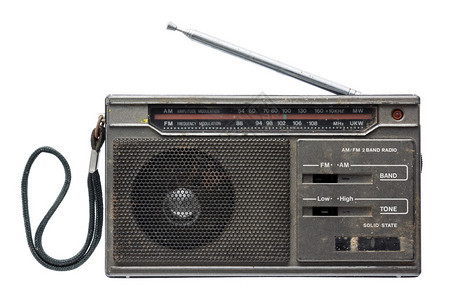 孤立在白色背景上的旧晶体管收音机背景图片
