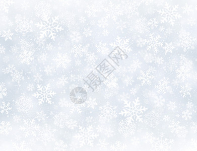 冰冻的灰色背景上的白色雪花图片