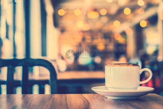 咖啡店咖啡厅的热咖啡杯旧图片