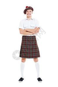 以白色背景被孤立的民族苏格兰服装中的快图片