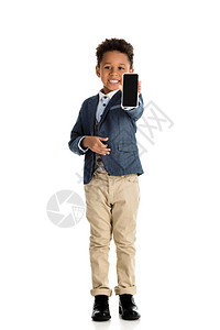 笑着的非裔美国小孩显示智能手机在图片