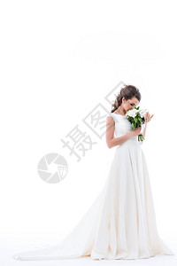穿着优雅白色礼服的年轻新娘图片