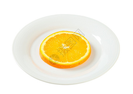 盘子里的新鲜橙片图片