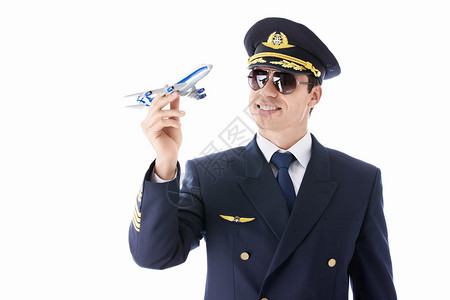 白色背景上的飞行员模型飞机图片