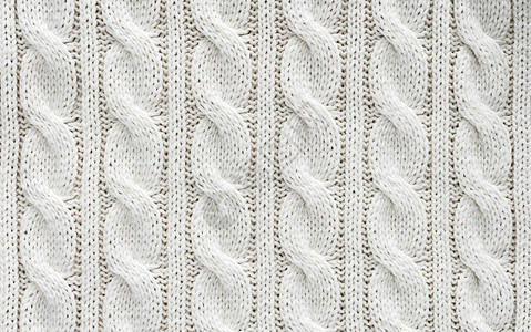 以花纹为背景的全框白色针织布图片素材