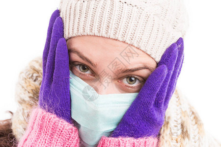 身戴不育医疗面具的寒冷妇女面部伤痛图片