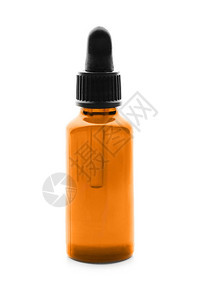 白色背景上的一瓶柑橘精油背景图片
