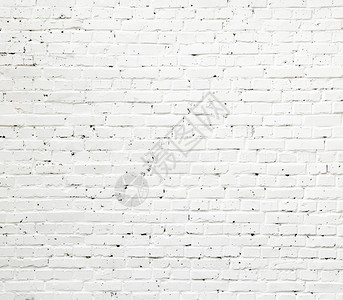一堵白色粗略纹理的砖墙涂有白色油漆图片