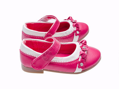 孤立在白色背景的粉红色童鞋背景图片