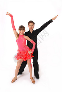 男孩和女孩在白色背景上跳舞交际舞背景图片