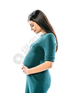 一面笑着的怀孕女孩与腹部背景图片