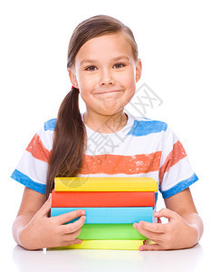 可爱的女孩正在读书学校教育概念孤图片