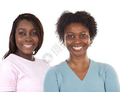 非裔美国人的两个姐妹在白种背景上图片