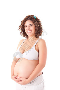 美丽的孕妇在白色背景上展示她的美图片