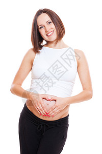 美丽的孕妇在白色背景中露出像图片