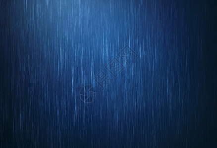 在雨季水滴落以深蓝色为草原背景的雨图片