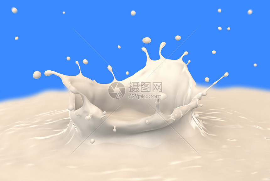 奶水喷射在蓝色背景上产图片