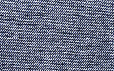 蓝色牛仔布纺织宏观照片坚固的棉经面织物表面斜纹织物图片