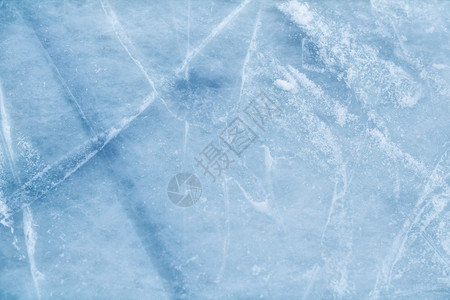 用冰刀划痕切割的冰面背景背景图片