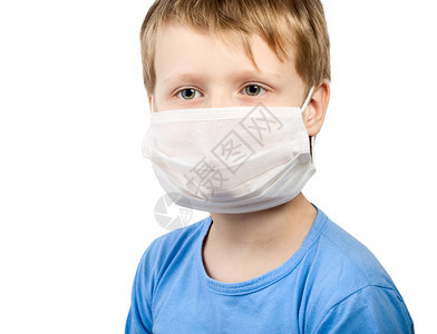 医学疗保健中患有流感的男孩子外科面罩图片