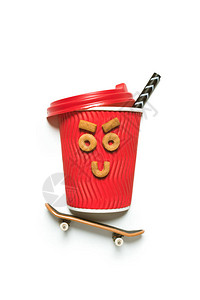 近视红咖啡杯的红色一次咖啡杯背景图片